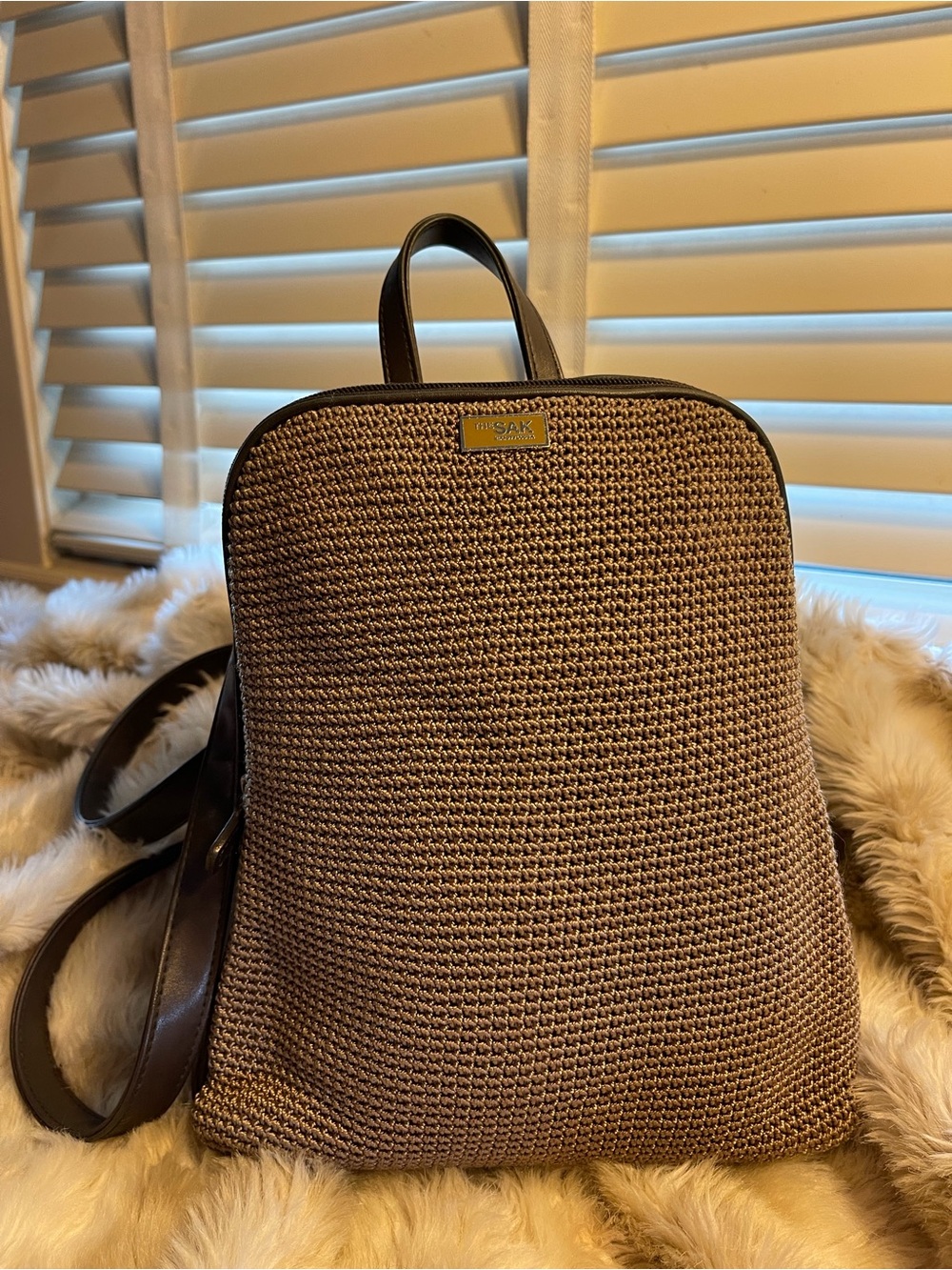 The Sak Brown Woven Backpack with Dark Trim